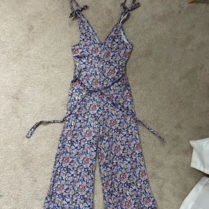 *NEVER WORN* Blue jumpsuit with tie straps